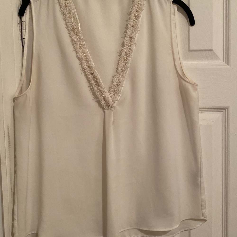 Zara sleeveless blouse with pearl detailing in the size XL